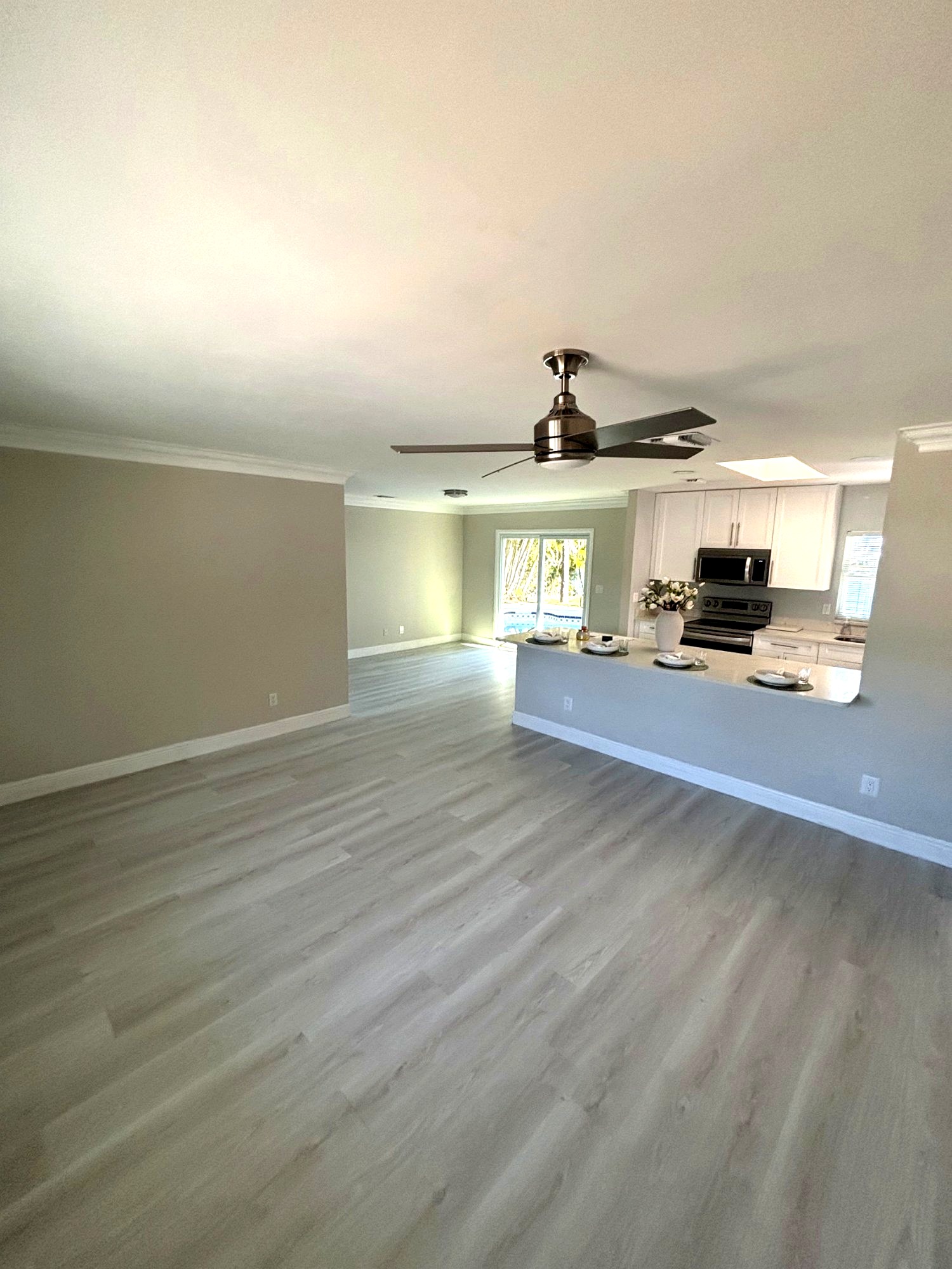 LVP flooring installation living room Palm Beach County
